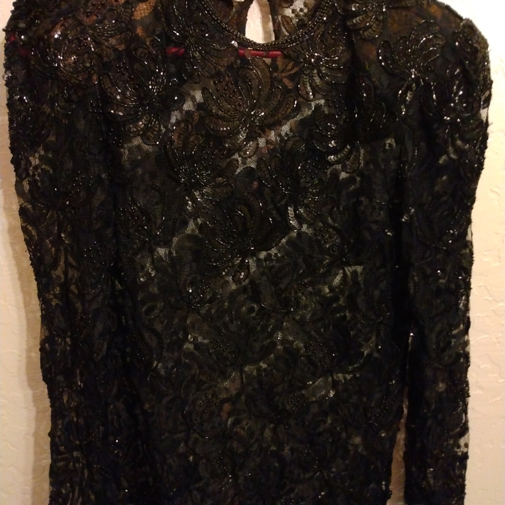 Womens sheer beaded lace and sequin formal blouse.